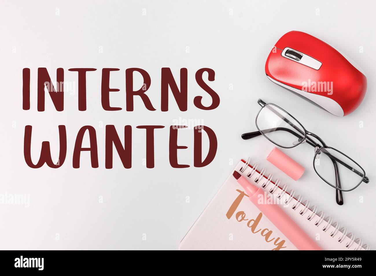 Handwriting text Interns Wanted. Internet Concept Looking for on the job trainee Part time Working student Stock Photo