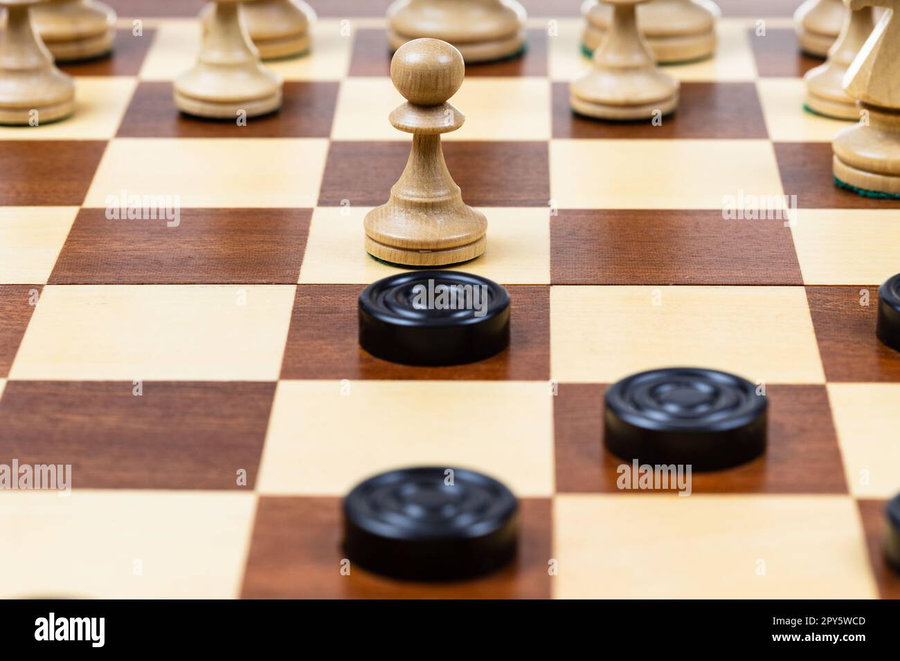 playing by different rules on the same board black checkers and white