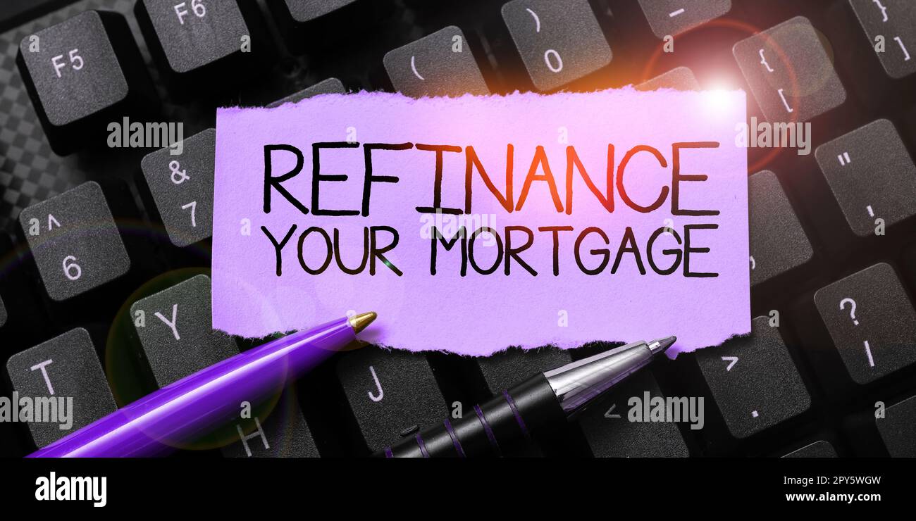 Text sign showing Refinance Your Mortgage. Word for allow borrower to obtain better interest term and rate Stock Photo