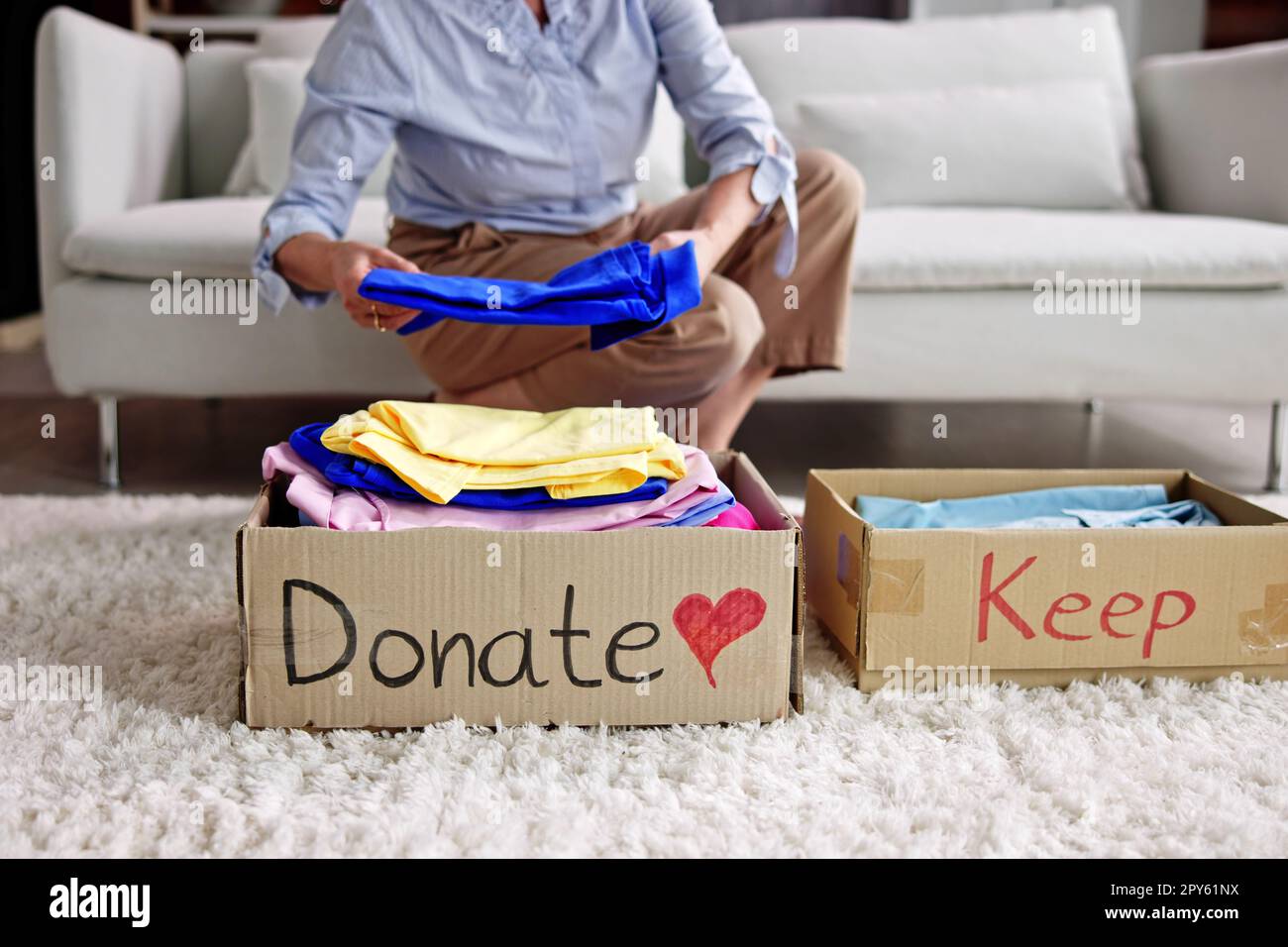 Donating Decluttering And Cleaning Up Wardrobe Stock Photo