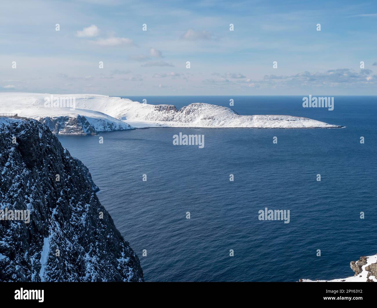 Snowy peninsula and cliffs at North Cape, Norway Stock Photo