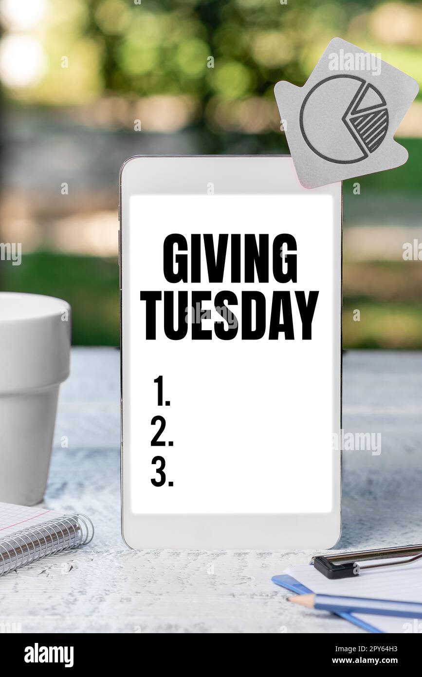 Conceptual caption Giving Tuesday. Word Written on international day of charitable giving Hashtag activism Stock Photo