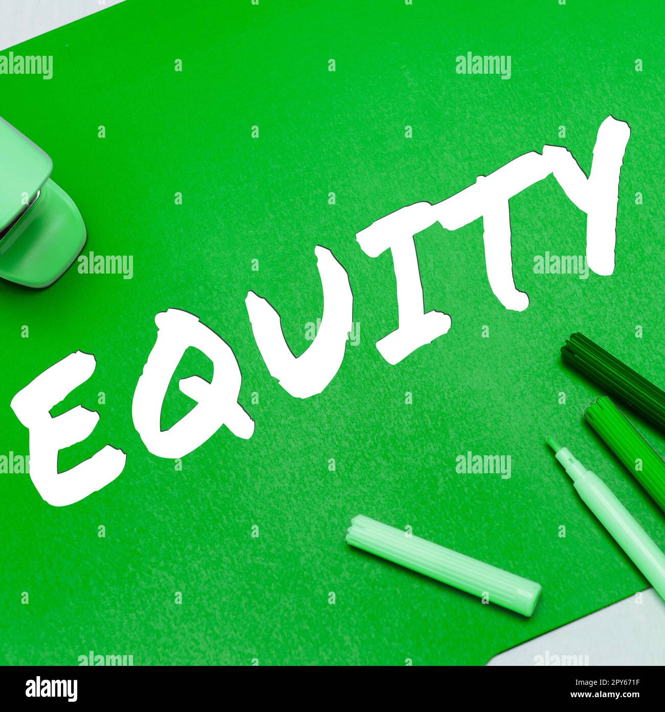 Conceptual caption Equity. Business idea quality of being fair and impartial race free One hand Unity Stock Photo