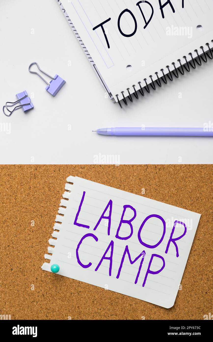 Sign displaying Labor Camp. Internet Concept a penal colony where forced labor is performed Stock Photo