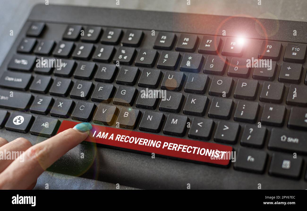 Conceptual caption I Am A Recovering Perfectionist. Internet Concept Obsessive compulsive disorder recovery Stock Photo