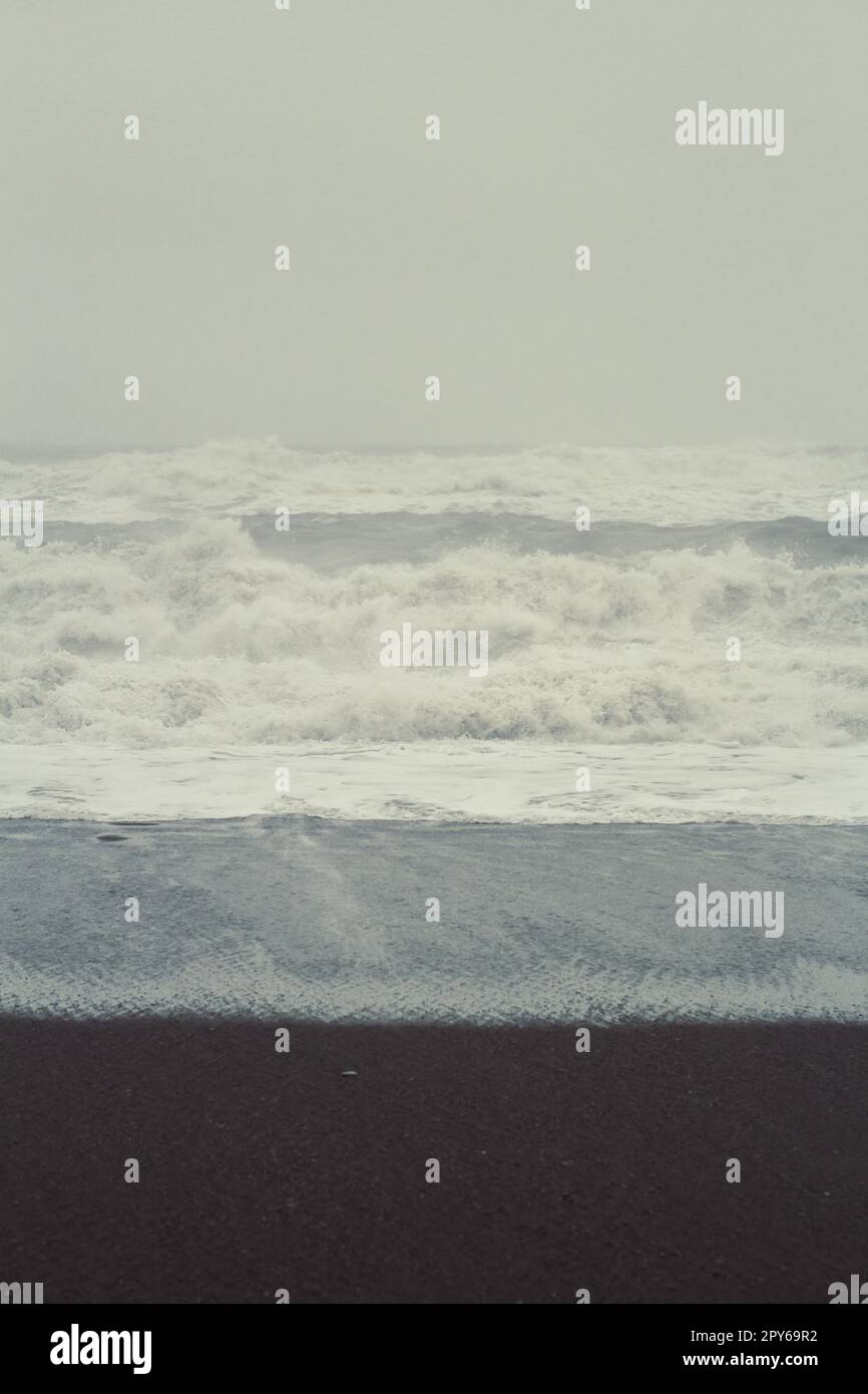 Wet surfline on stormy day landscape photo Stock Photo