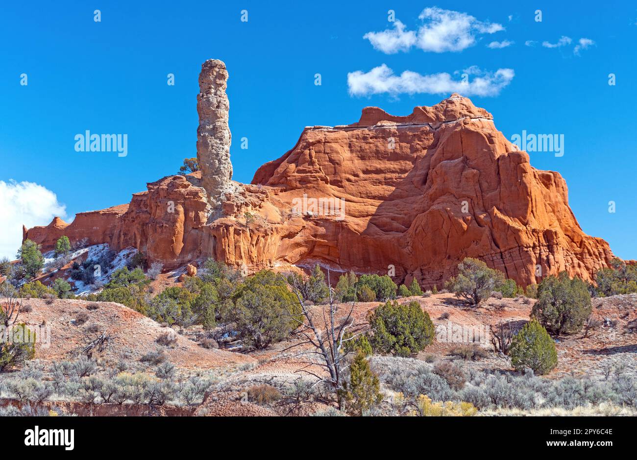 Limestone Pinnacle Protruding From a Sandstone Ridge in Kodachrome