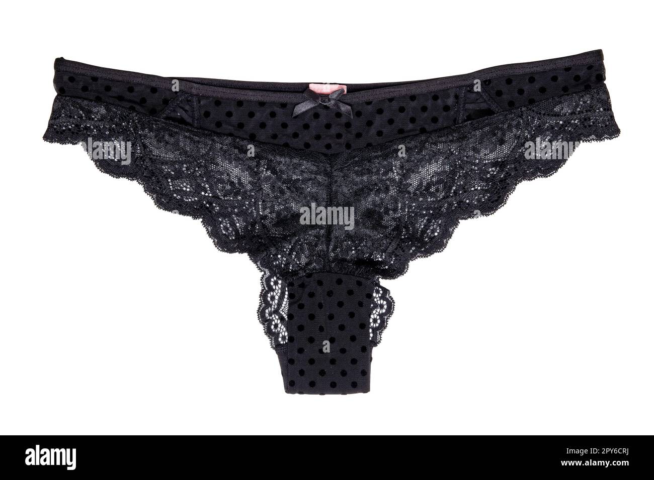 Underwear woman isolated. Close-up of luxurious elegant black lacy thongs panties isolated on a white background. Clipping path. Underwear fashion. Stock Photo