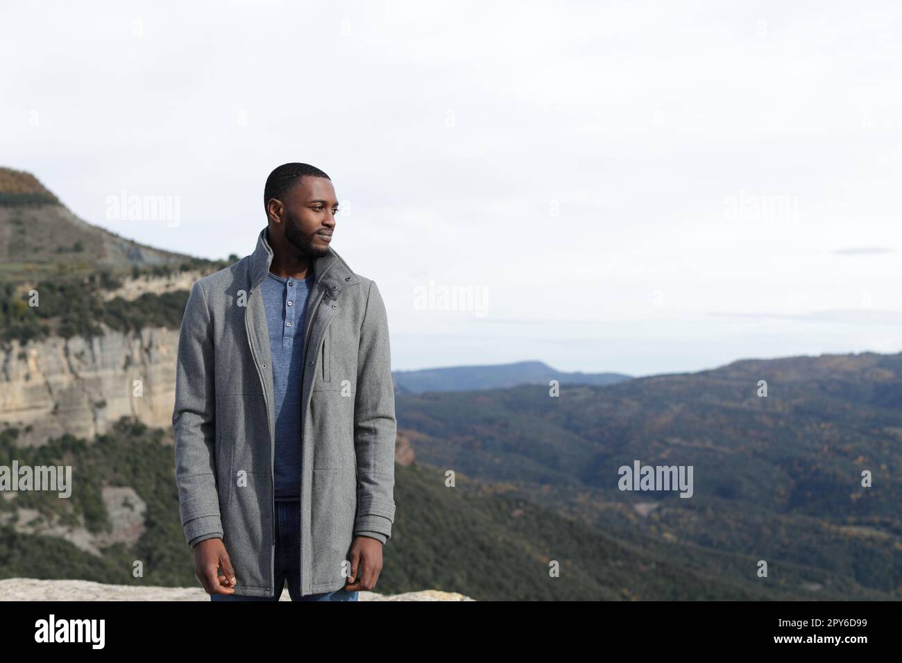 Black man contemplating in winter Stock Photo