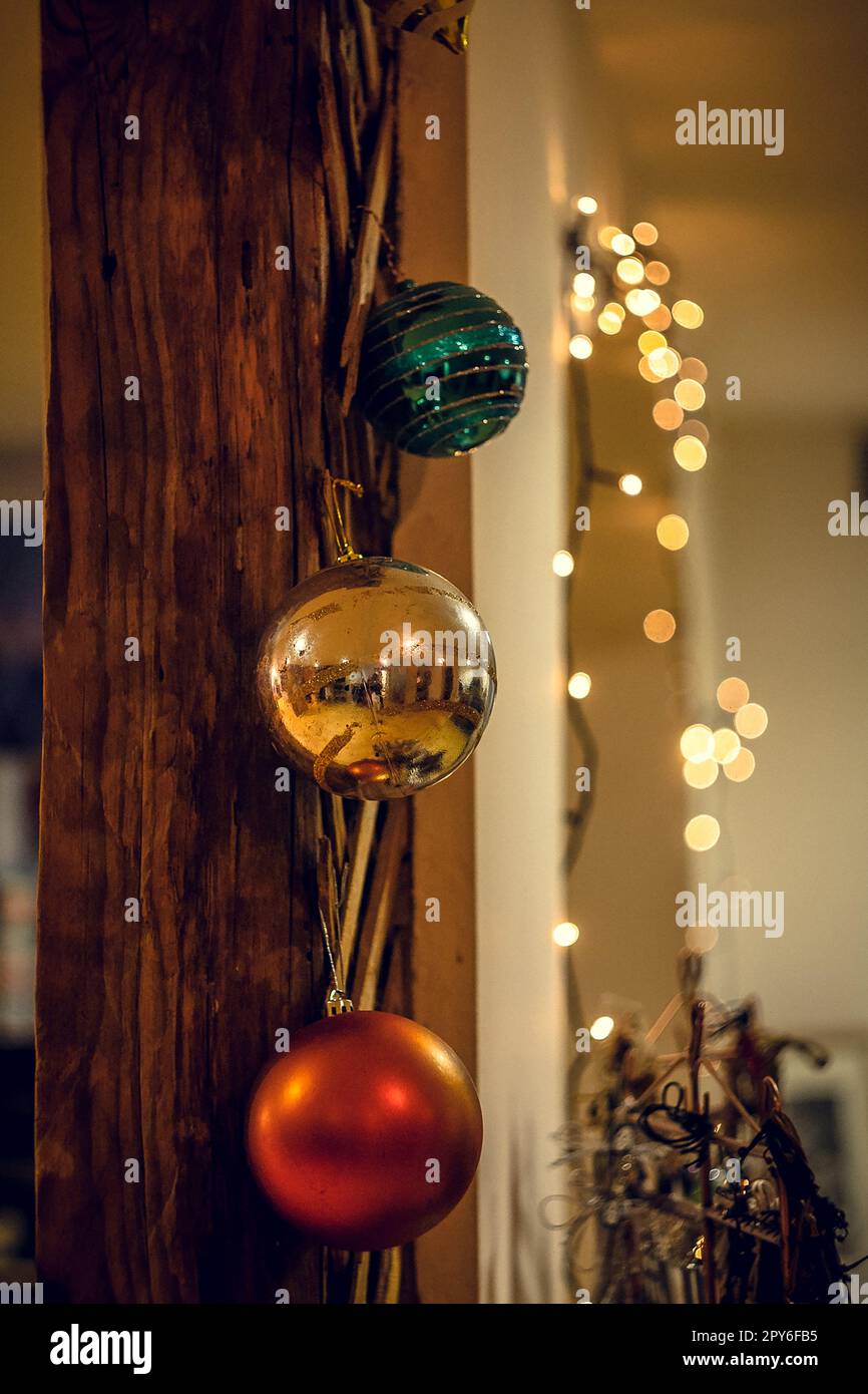 Close up Christmas ornaments hanging on wall concept photo Stock Photo