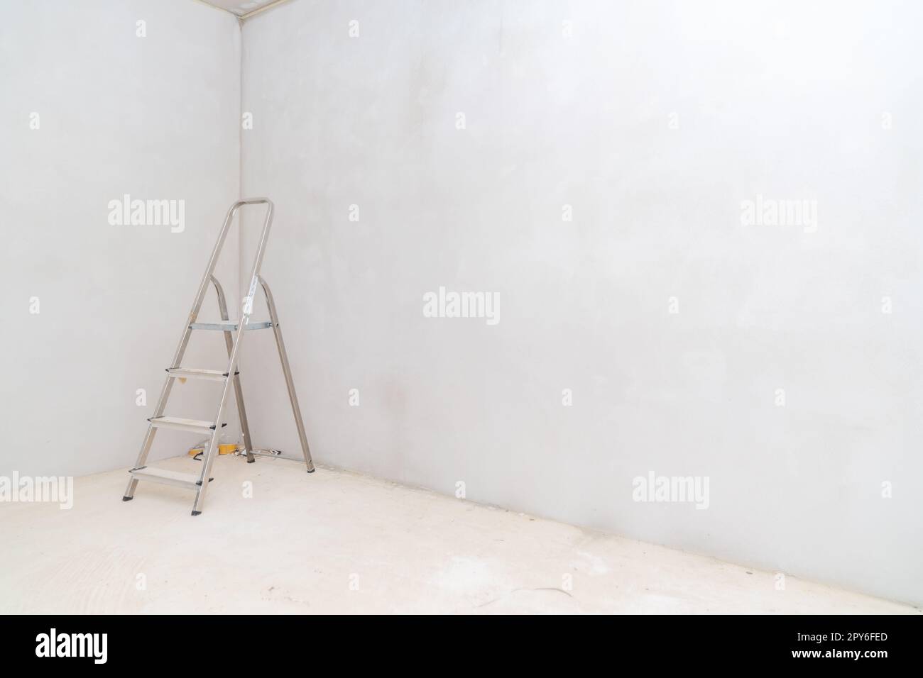 folding ladder on construction site Stock Photo - Alamy