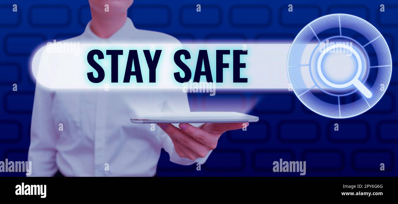 Sign displaying Stay Safe. Word Written on secure from threat of danger, harm or place to keep articles Stock Photo