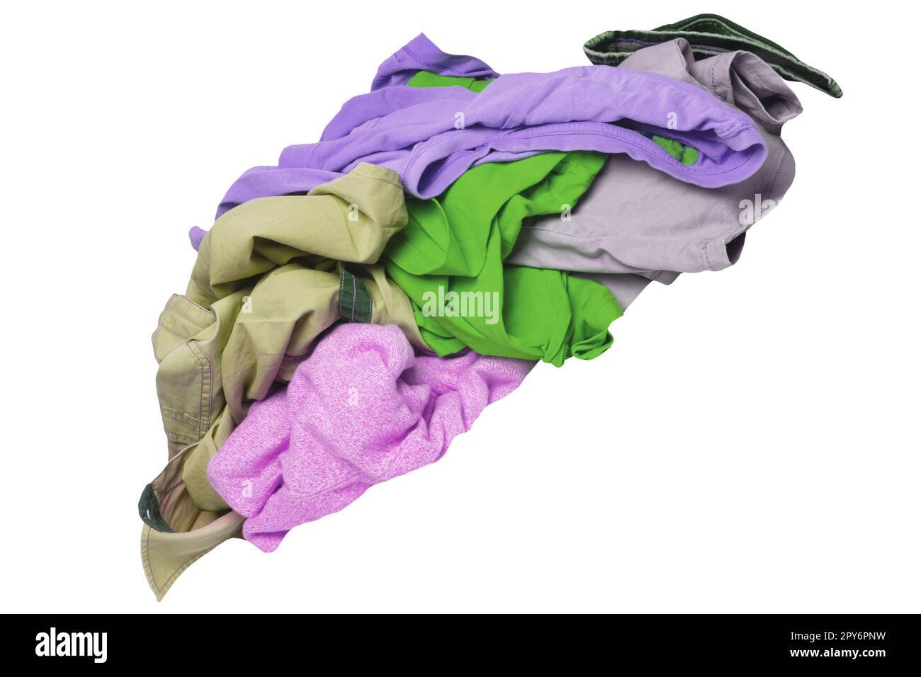 Heap of clothing. Pile or stack of colorful dirty messy clothes ready for the laundry isolated on a white background. Clipping path. Stock Photo