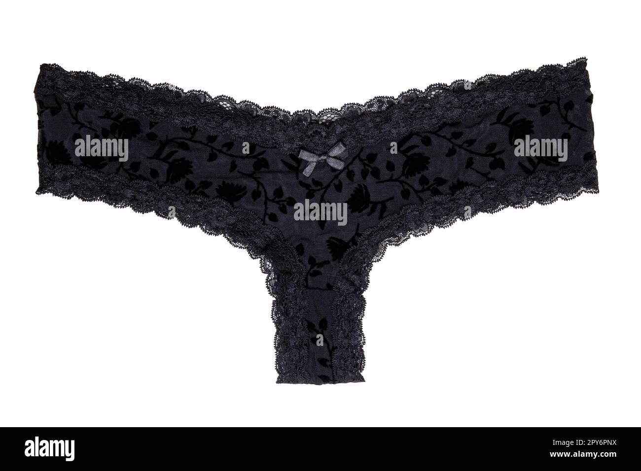Underwear woman isolated. Close-up of luxurious elegant black lacy thongs panties isolated on a white background. Clipping path. Underwear fashion. Stock Photo