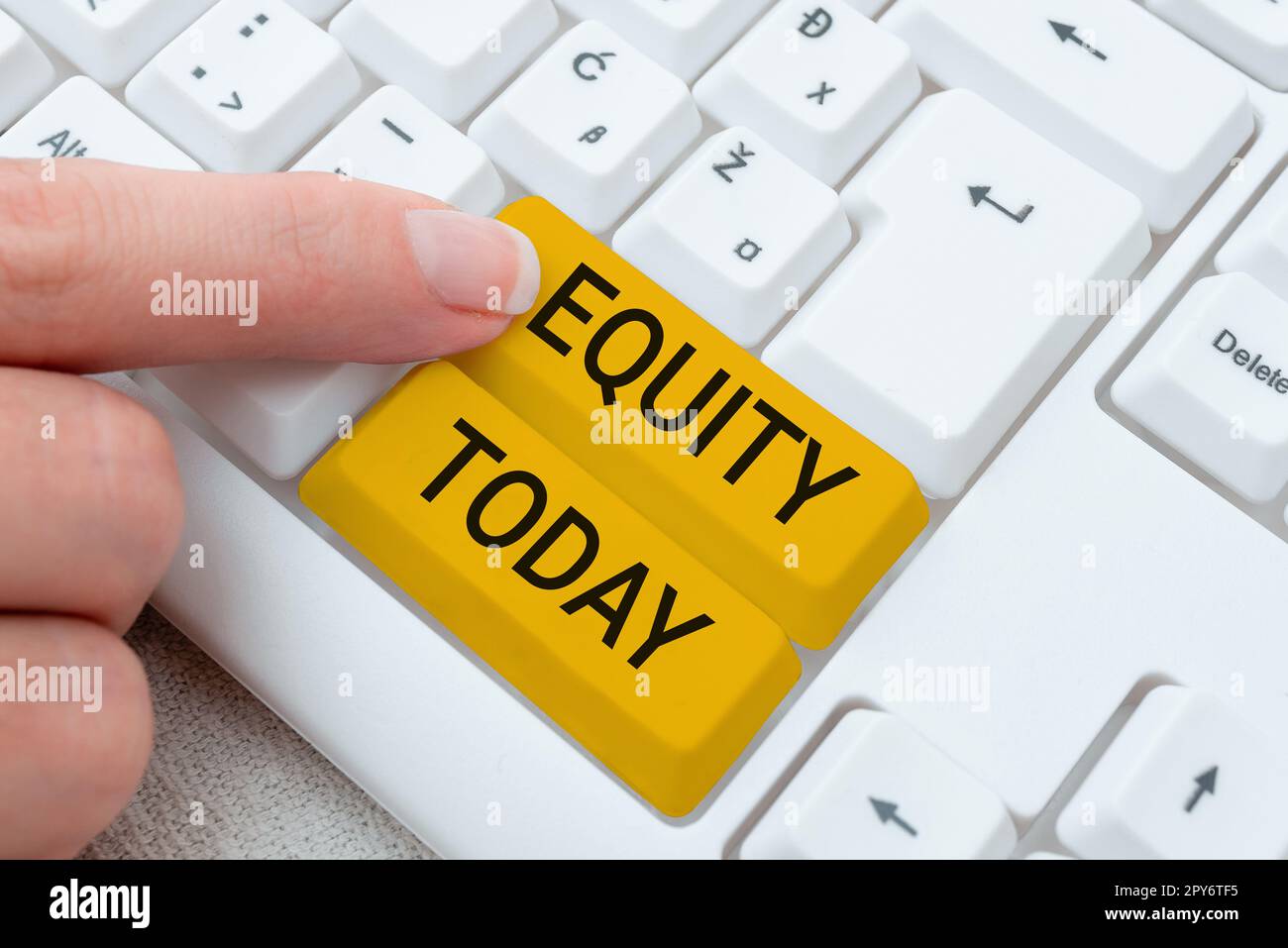 Conceptual caption Equity. Word for quality of being fair and impartial race free One hand Unity Stock Photo