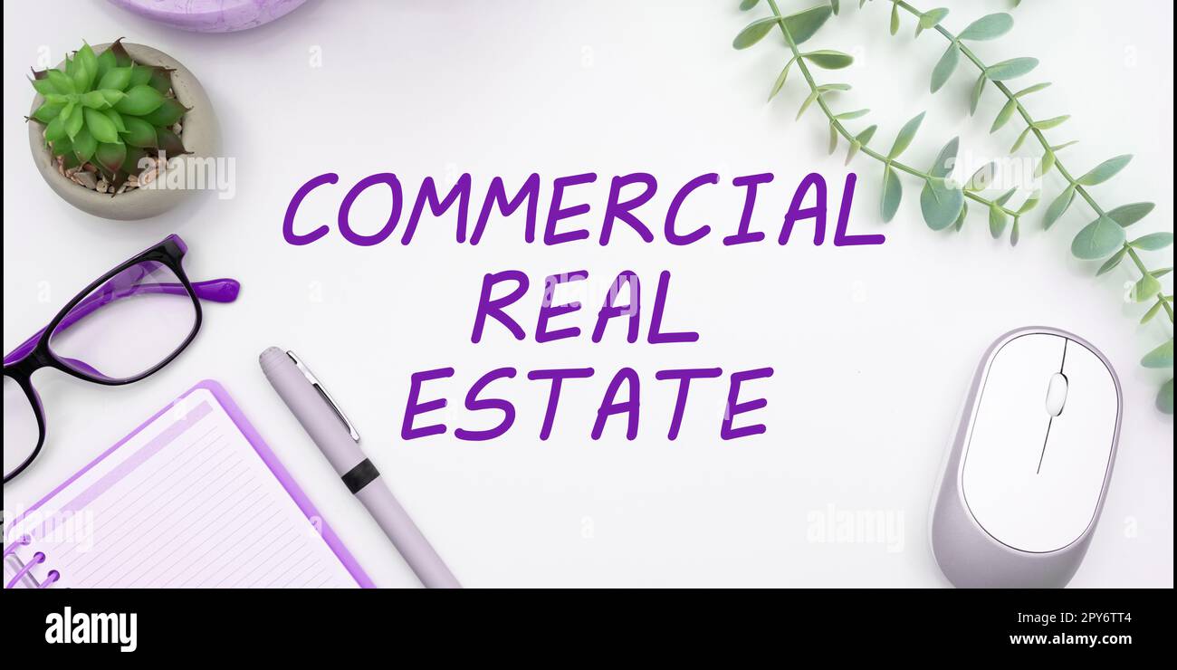 Sign displaying Commercial Real Estate. Word Written on Income Property Building or Land for Business Purpose Stock Photo