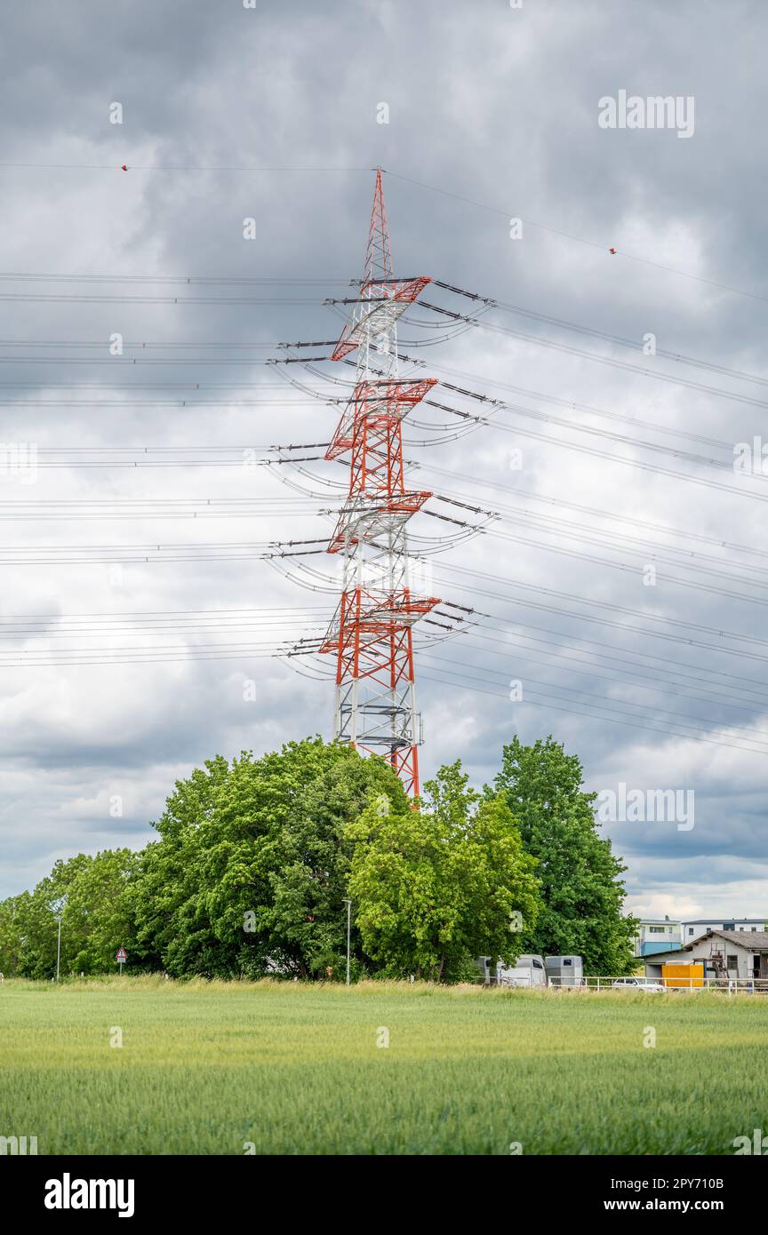 Pylon View Electricity Pylon stripes white and red, view from low angle during ...