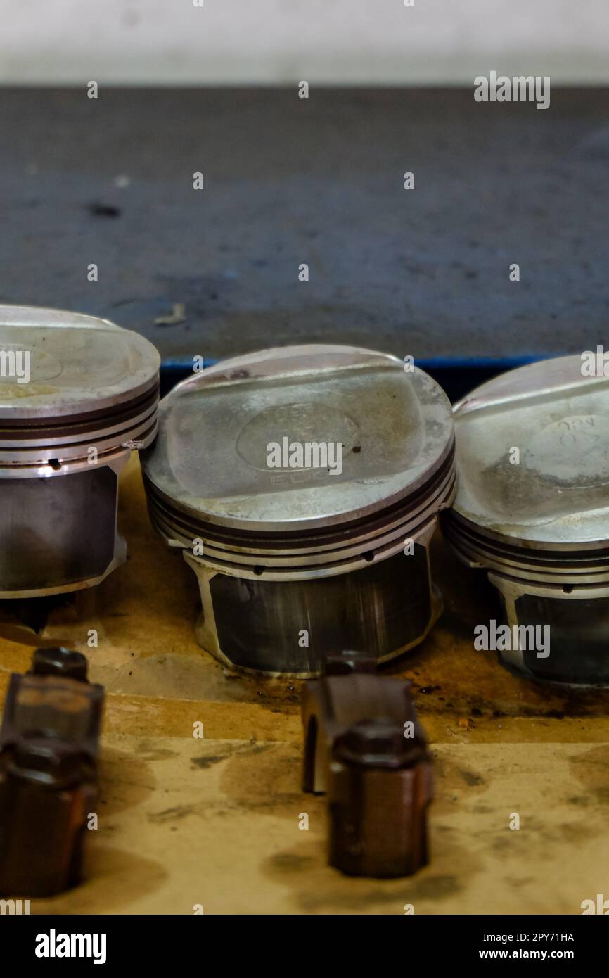 spare parts such as pistons, valves and other gasoline engine parts