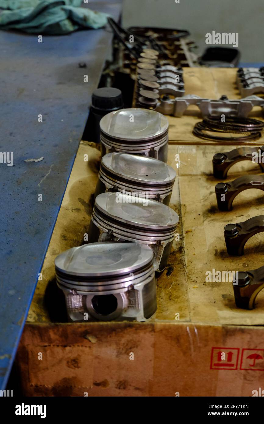 spare parts such as pistons, valves and other gasoline engine parts