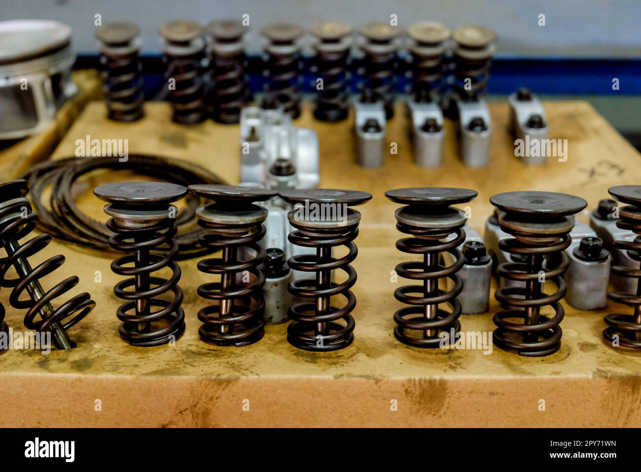 spare parts such as pistons, valves and other gasoline engine parts