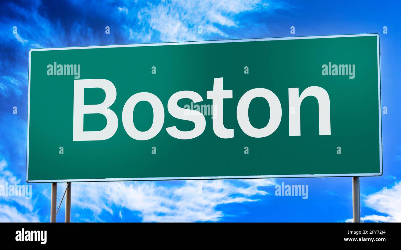 Road sign informing of the entrance to the city of Boston Stock Photo
