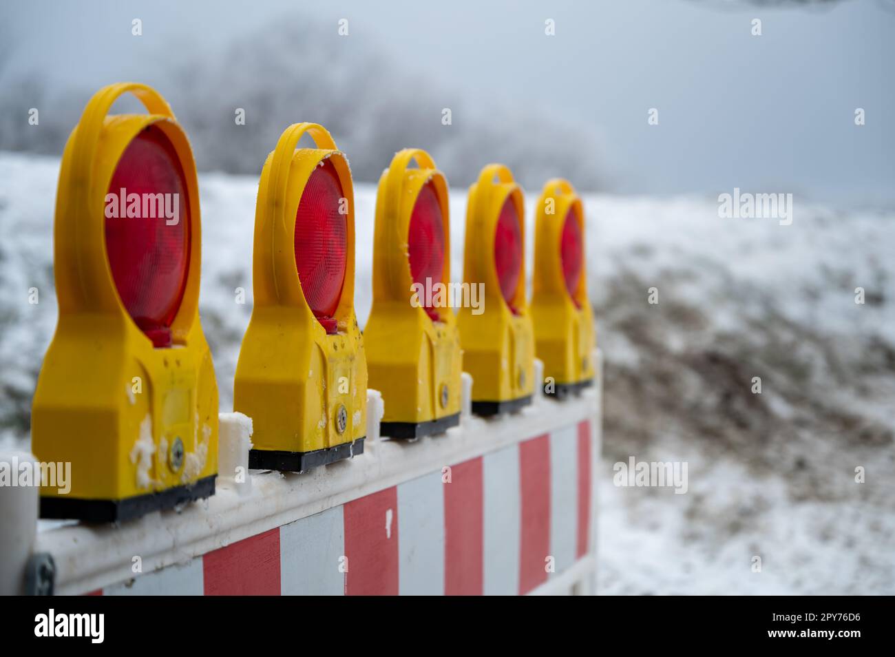 Closed because of snow, fence do not pass. barricade Stock Photo