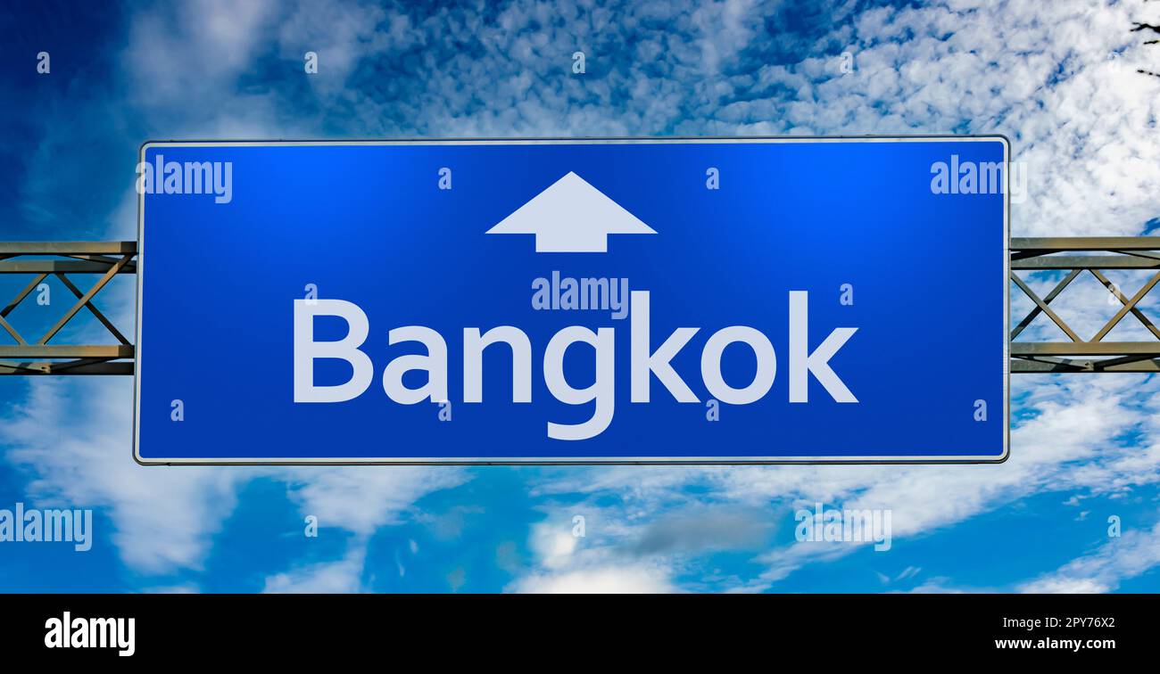 Road sign indicating direction to the city of  Bangkok Stock Photo