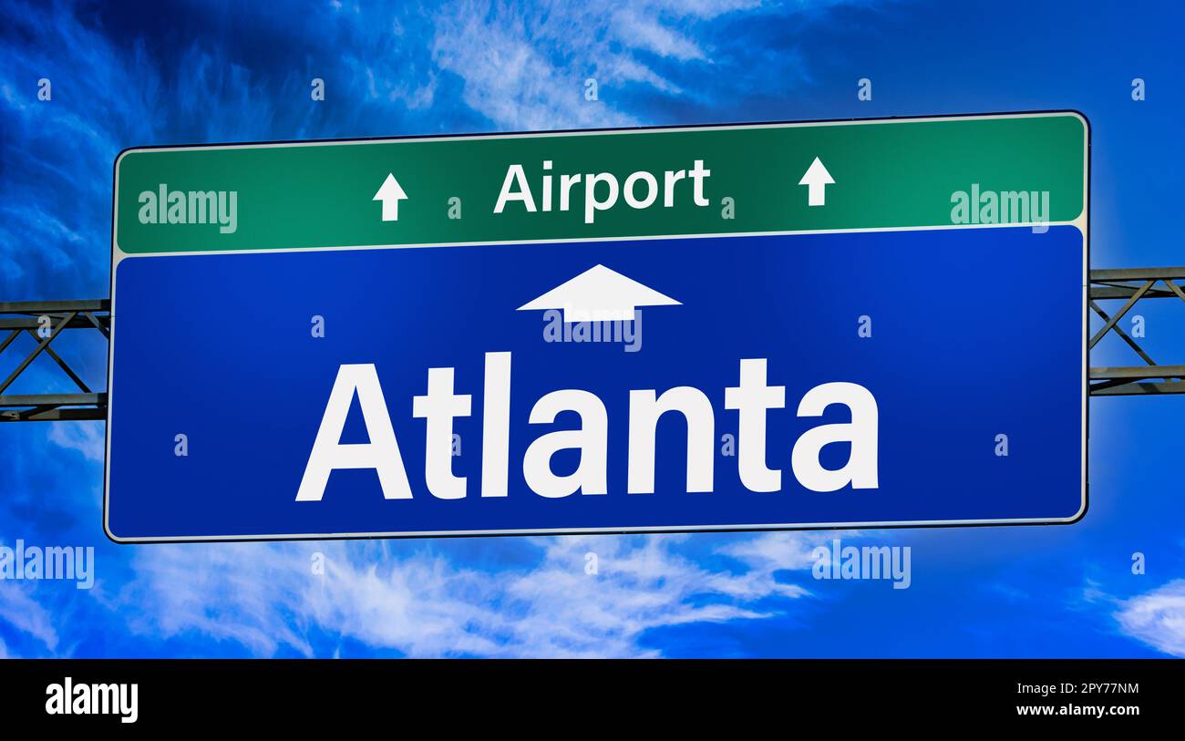 Road sign indicating direction to the city of Atlanta Stock Photo