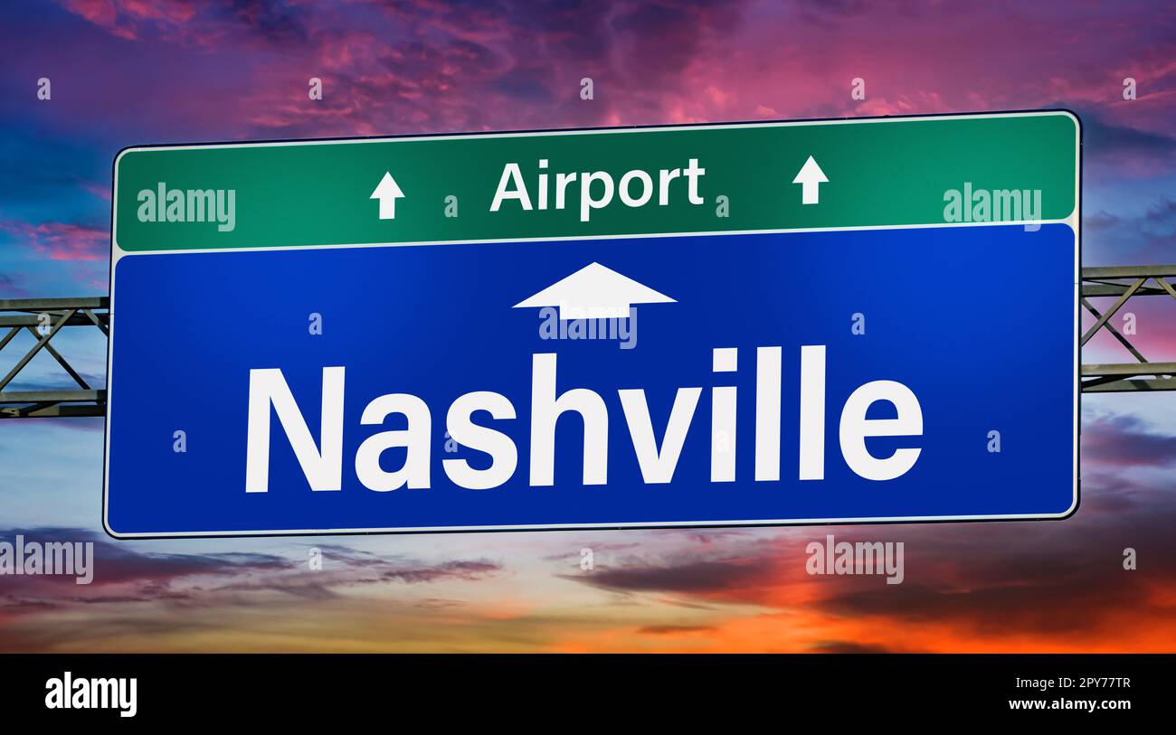 Road sign indicating direction to the city of Nashville Stock Photo