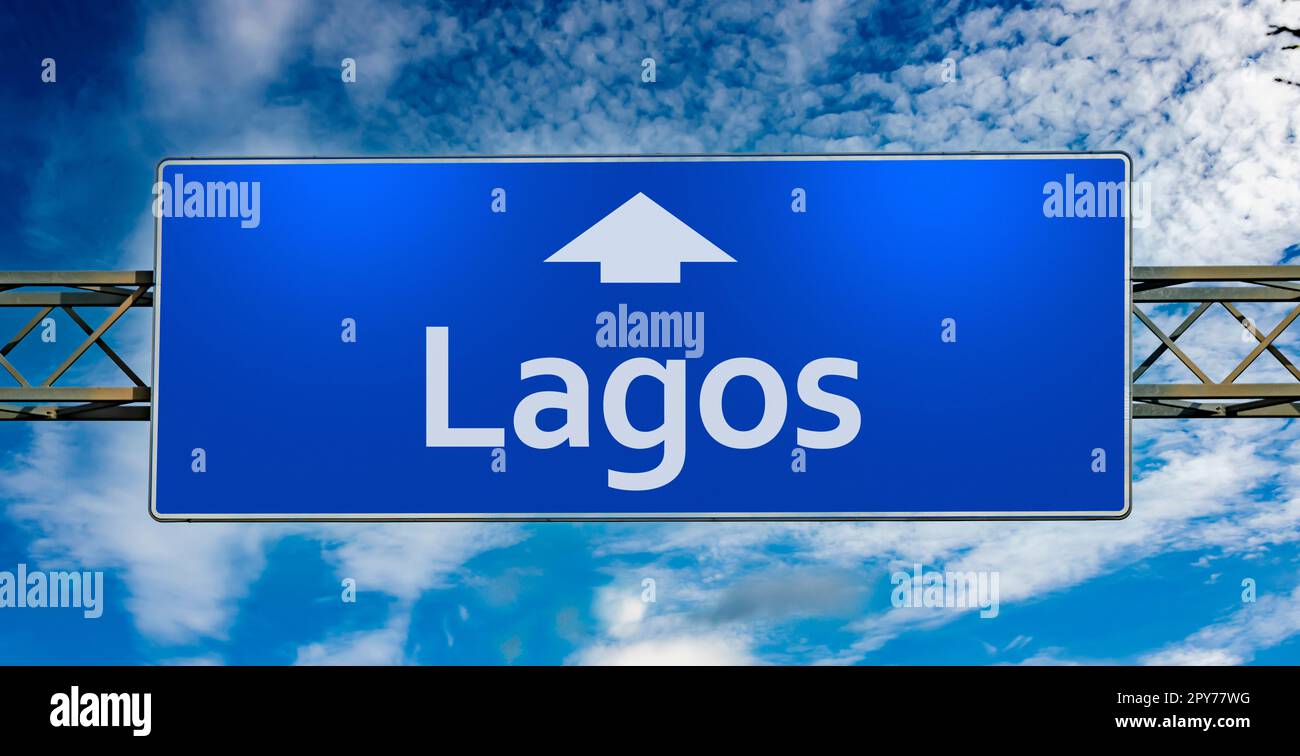 Road sign indicating direction to the city of Lagos Stock Photo