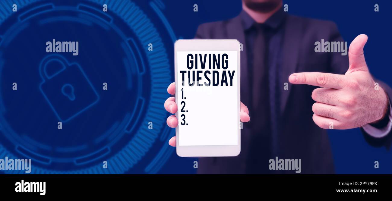 Text sign showing Giving Tuesday. Concept meaning international day of charitable giving Hashtag activism Stock Photo
