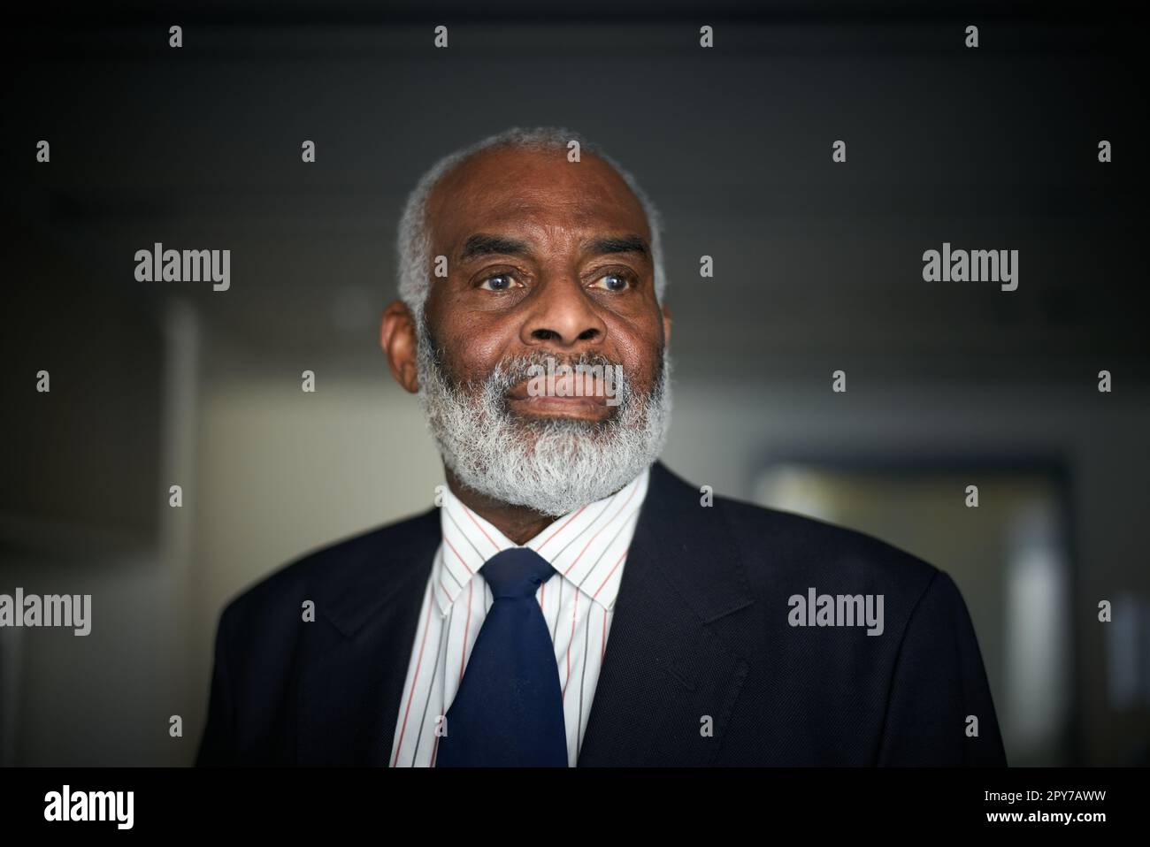 Portrait of Dr Neville Lawrence ahead of the 30th anniversary of his son's murder, Ministry of Justice,102 Petty France, London, England, UK. Stock Photo