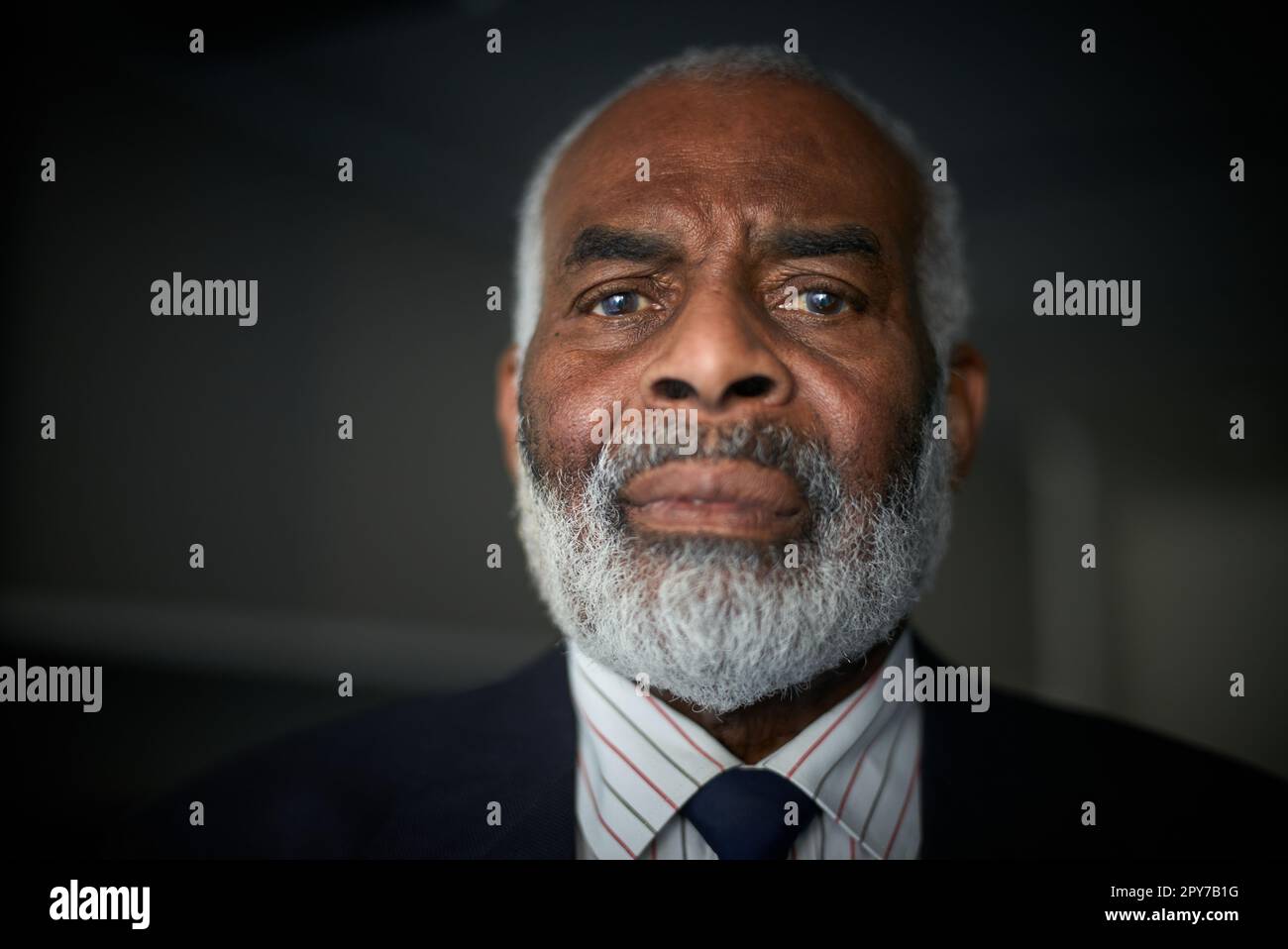 Portrait of Dr Neville Lawrence ahead of the 30th anniversary of his son's murder, Ministry of Justice,102 Petty France, London, England, UK. Stock Photo