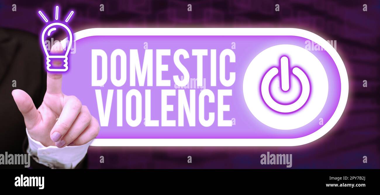 Sign displaying Domestic Violence. Word for violent or abusive behavior directed by one family or household member Stock Photo