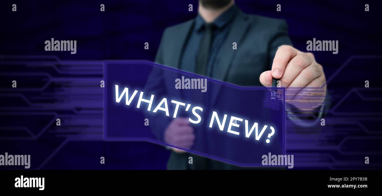 Hand writing sign What's New. Business overview Asking about latest ...
