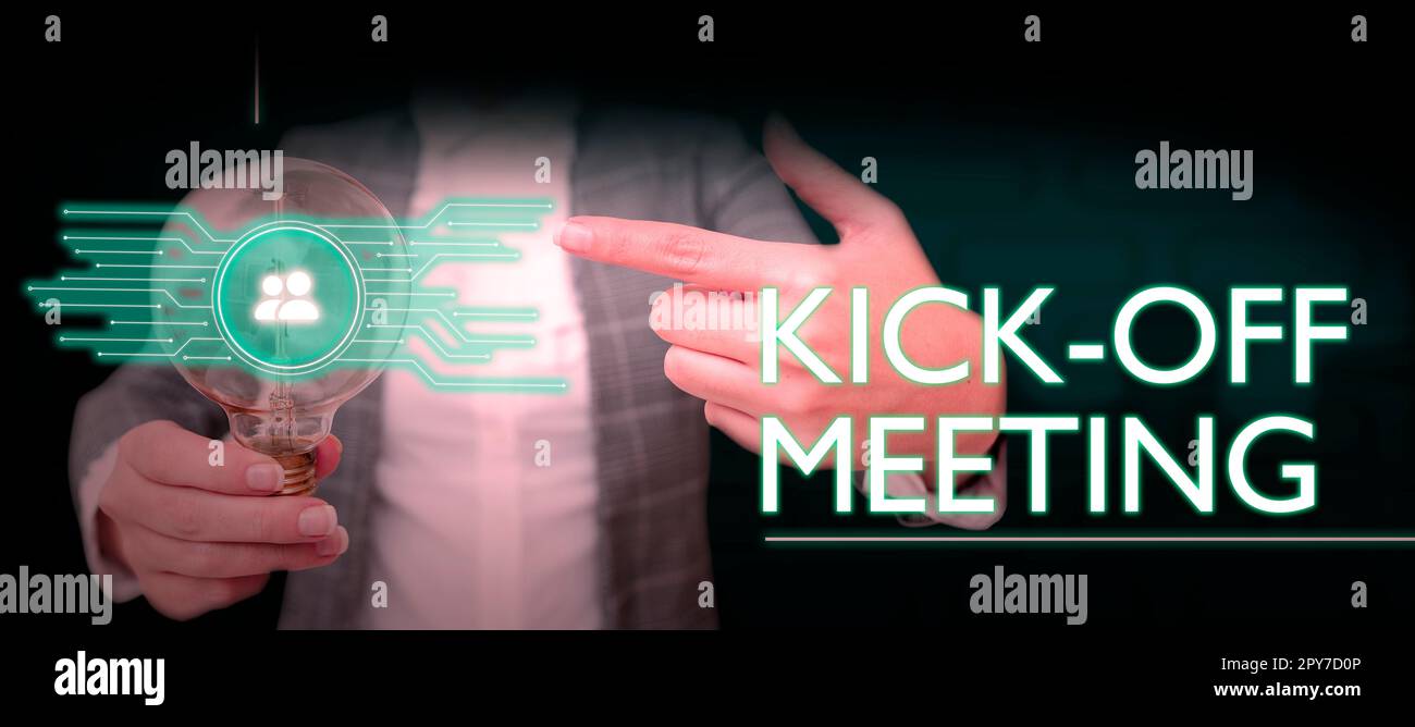 Hand writing sign Kick Off Meeting. Word Written on first meeting with ...