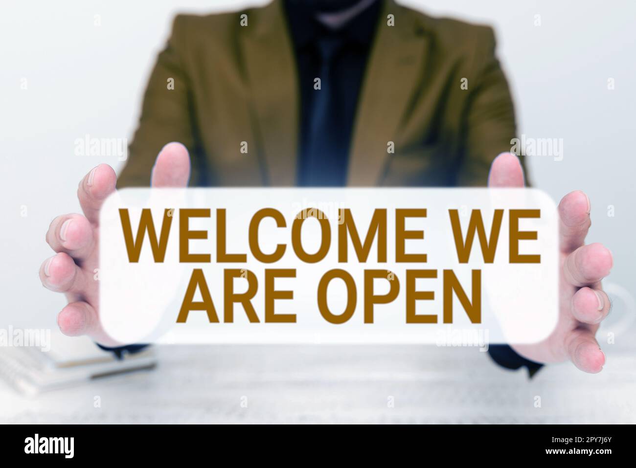 Sign displaying Welcome We Are Open. Word for Greeting making part of a work group new people Stock Photo