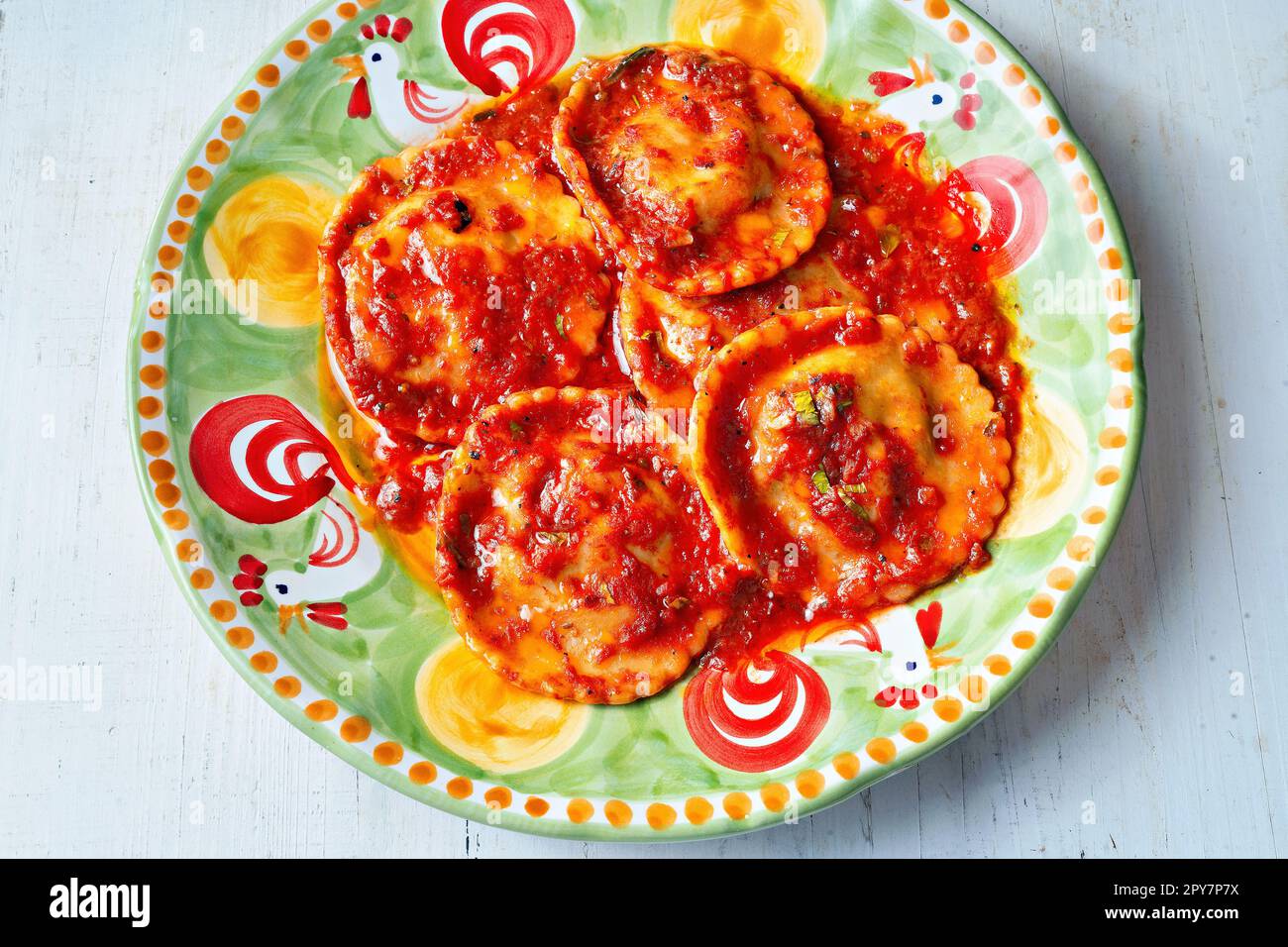 italian ravioli pasta in tomato sauce Stock Photo