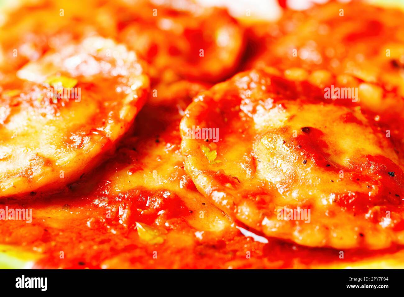 italian ravioli in tomato sauce Stock Photo