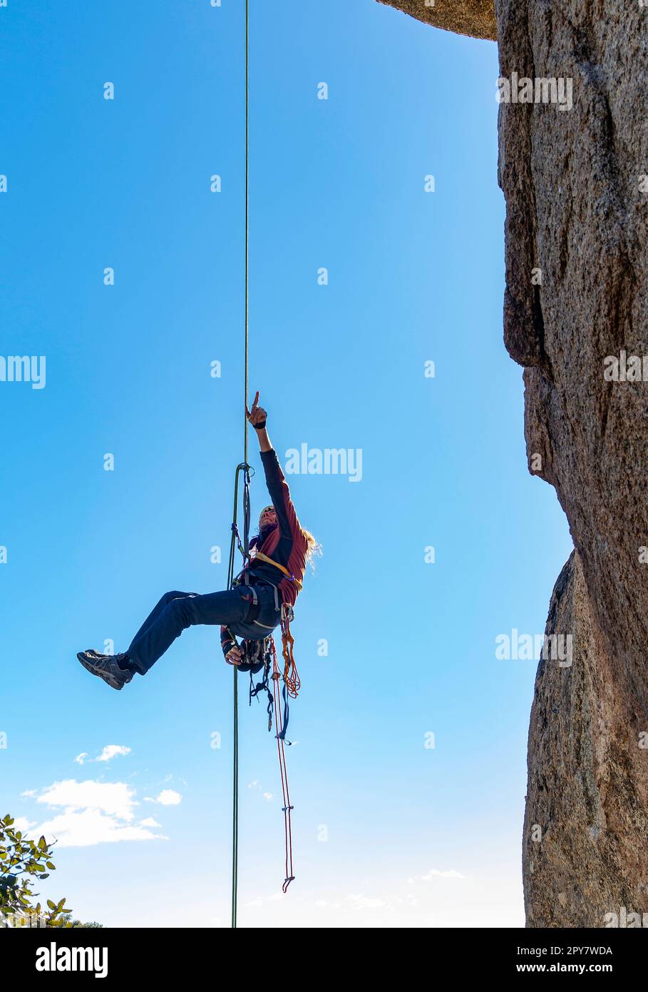 Climber rappelling rock wall hi-res stock photography and images - Alamy