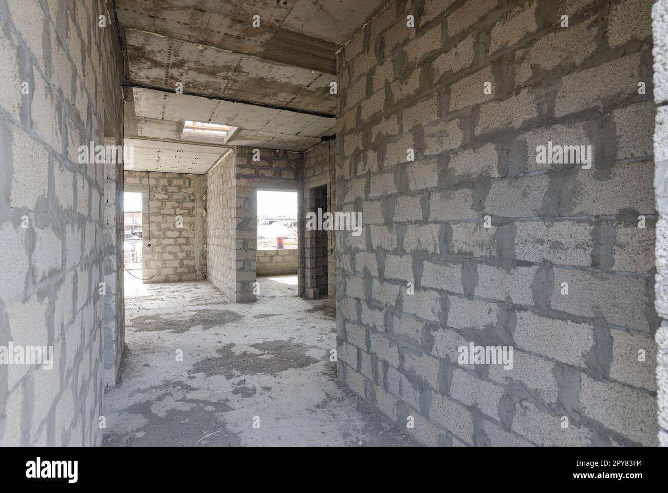 Construction of an individual residential building, a corridor from the front door to the rooms Stock Photo