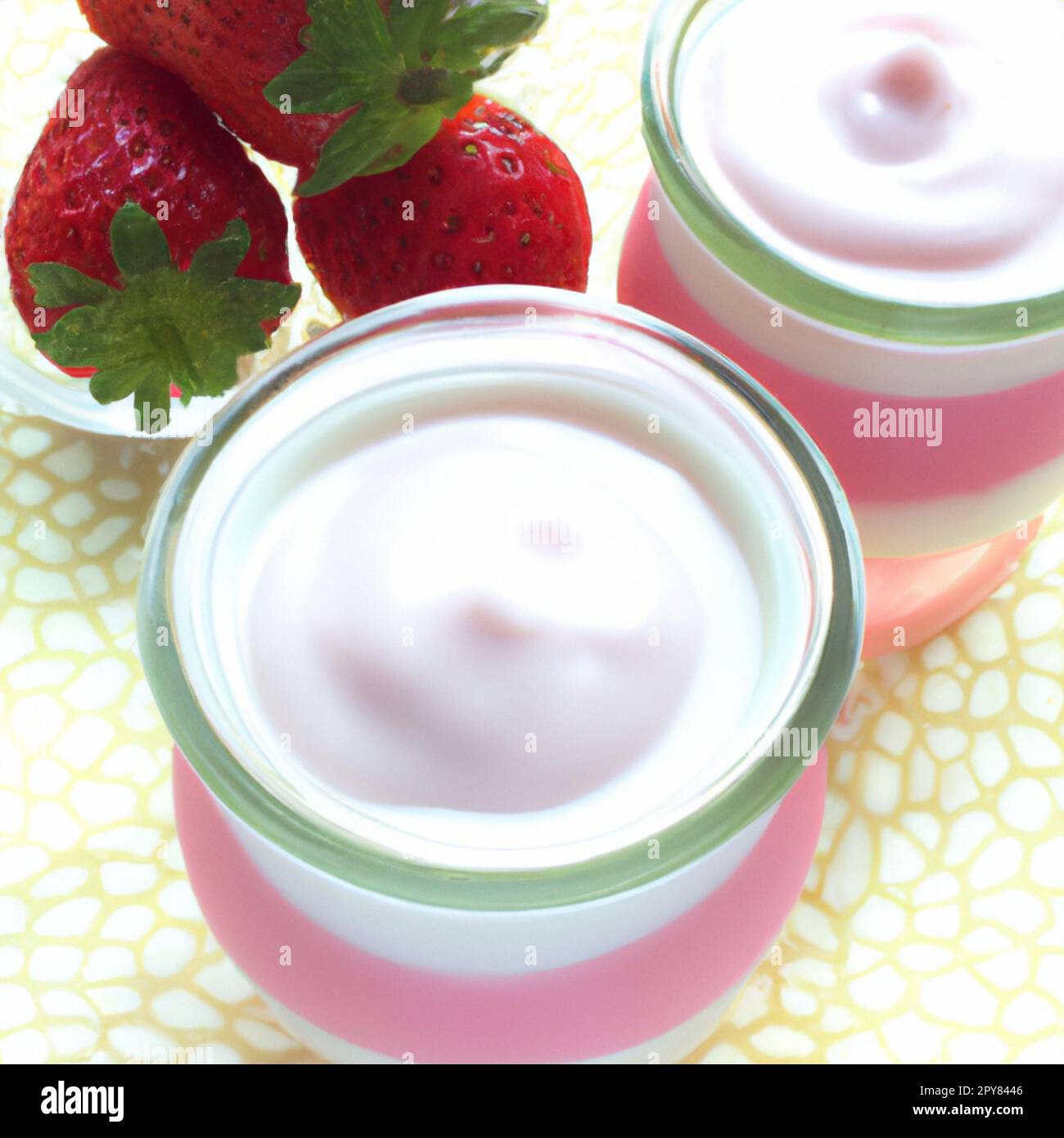 Thick white pink yogurt in a glass bowl or bowl. Ripe strawberries with leaves. Advertisement for strawberry yogurt, milkshake, sour cream, ice cream Stock Photo