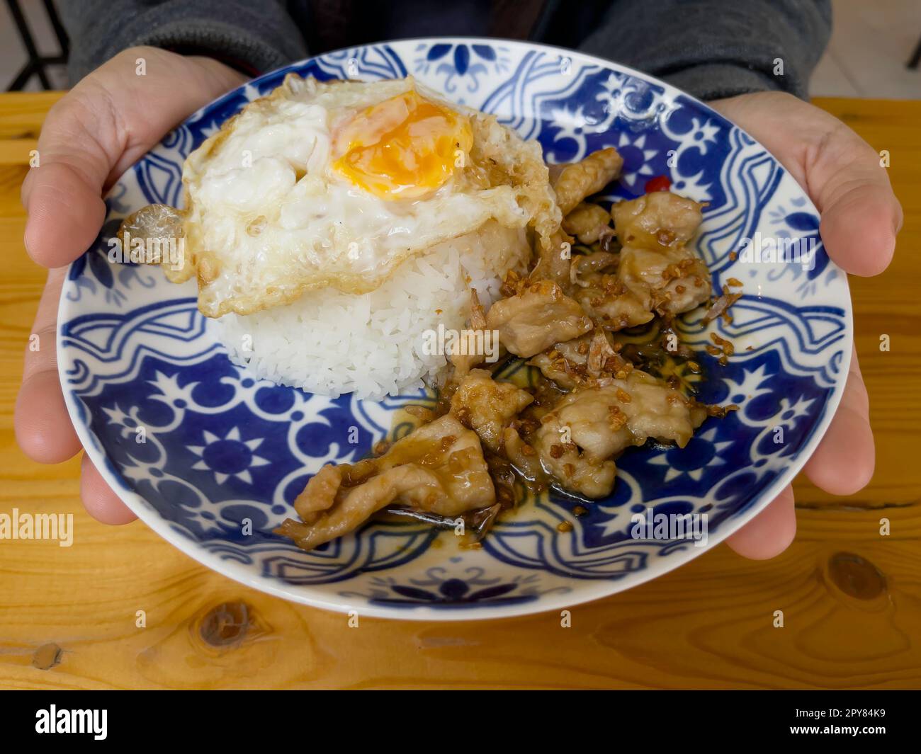 Stir fried crispy pork with rice Stock Photo