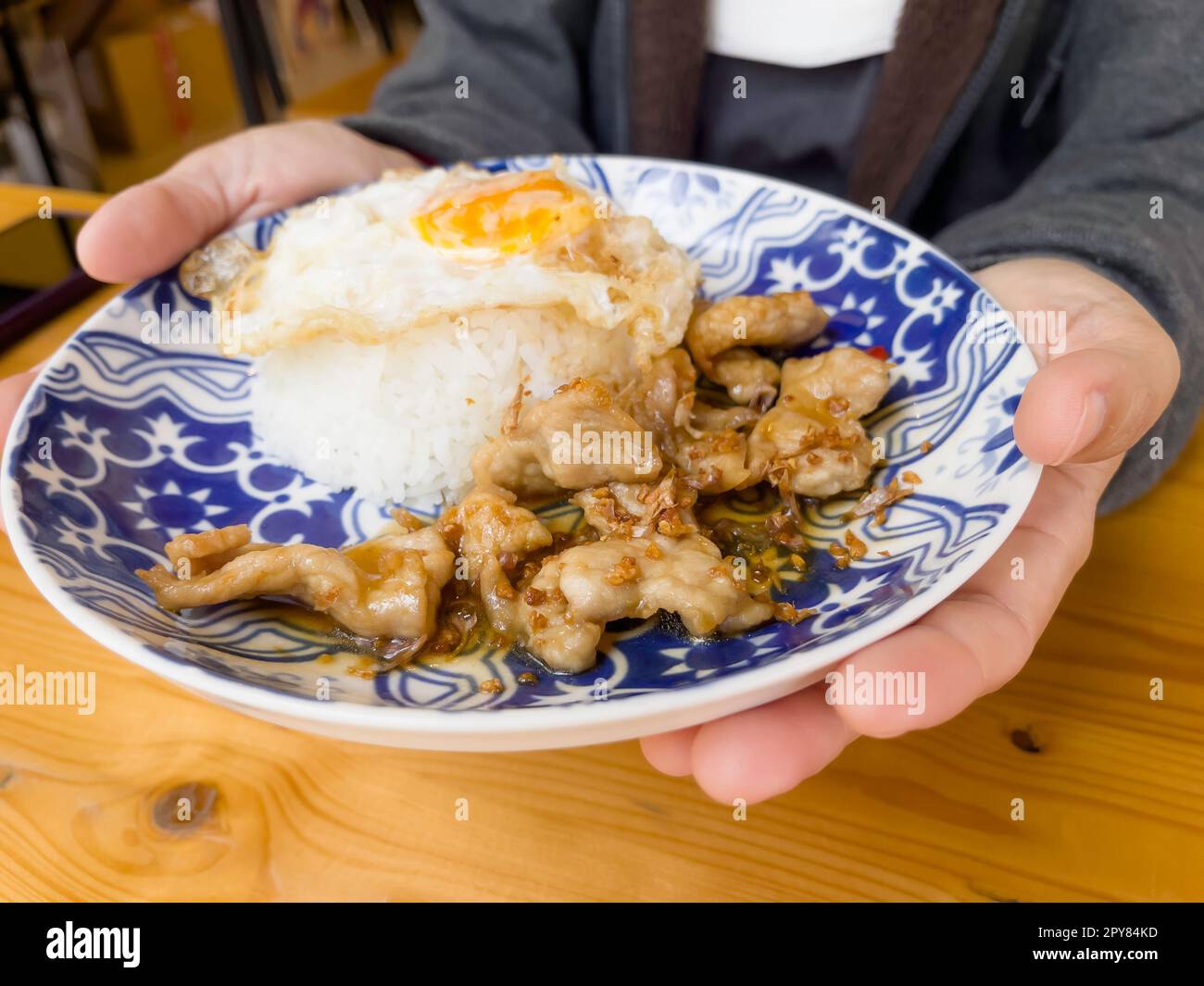 Stir fried crispy pork with rice Stock Photo