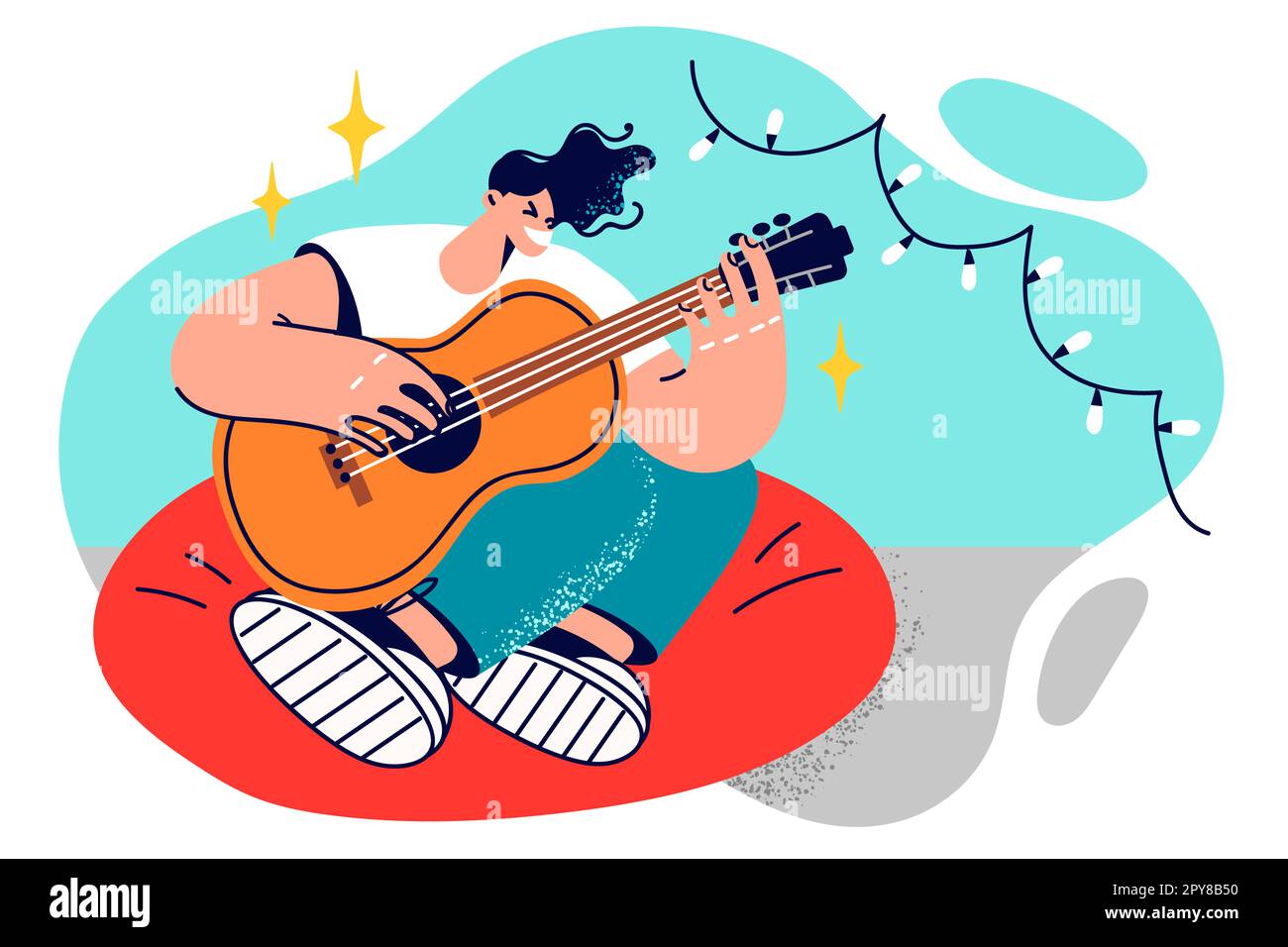 Man guitarist sits in chair with legs folded and plays guitar inventing