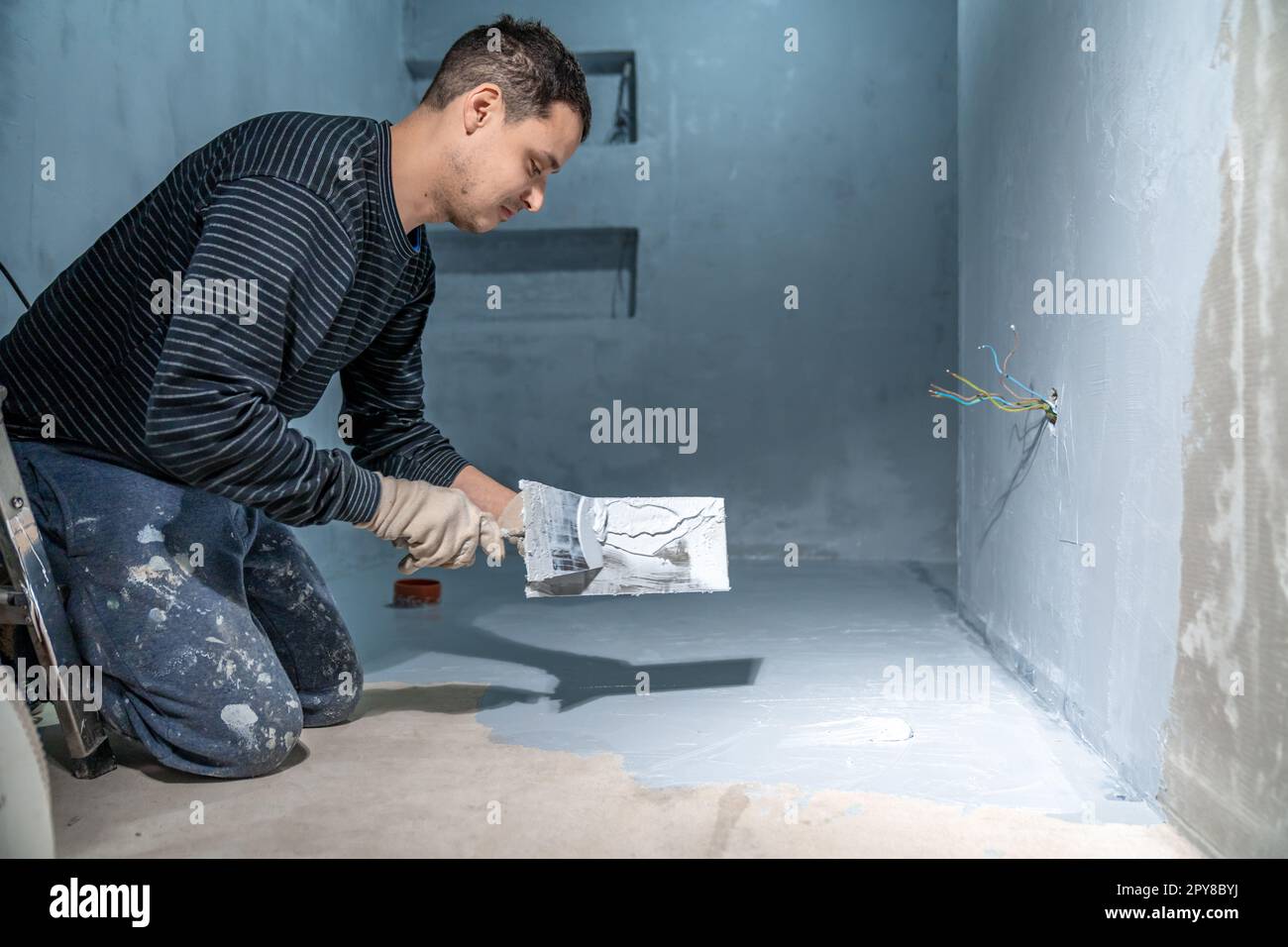 waterproofing of the bathroom floor in a new building Stock Photo Alamy