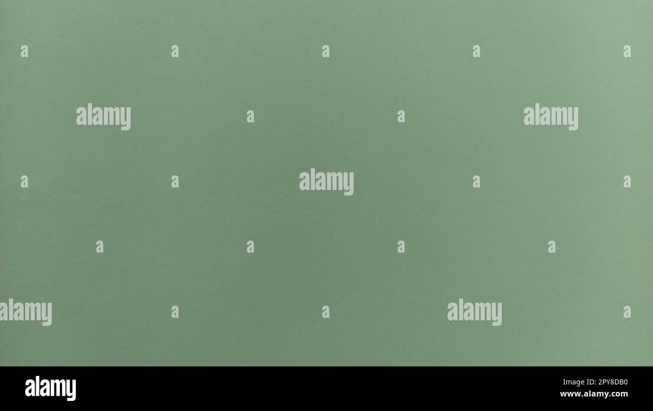 A sheet of light green paper with at the bottom. Calm green with fine paper texture