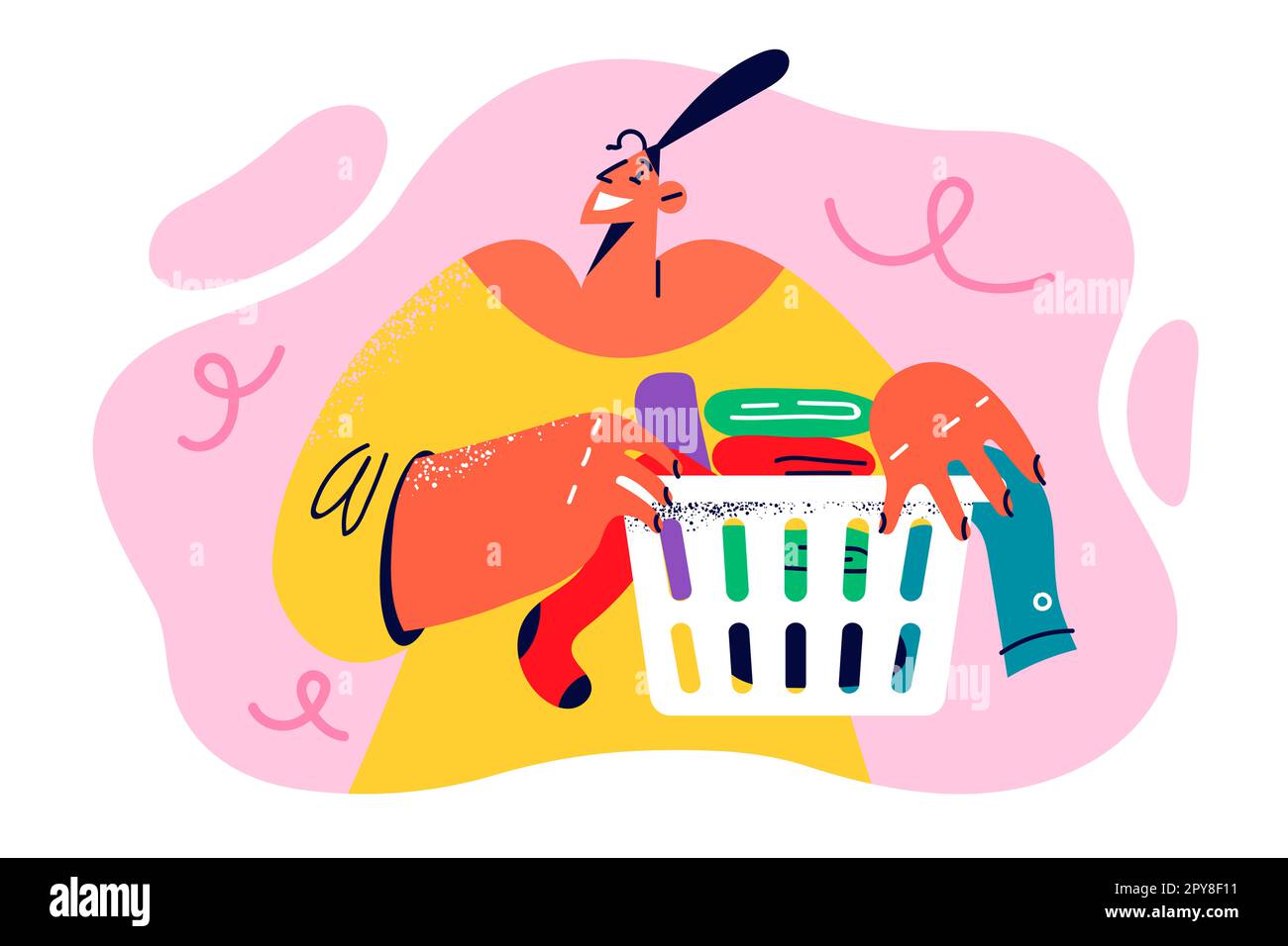 Happy woman housewife holding basket with clean clothes and towels