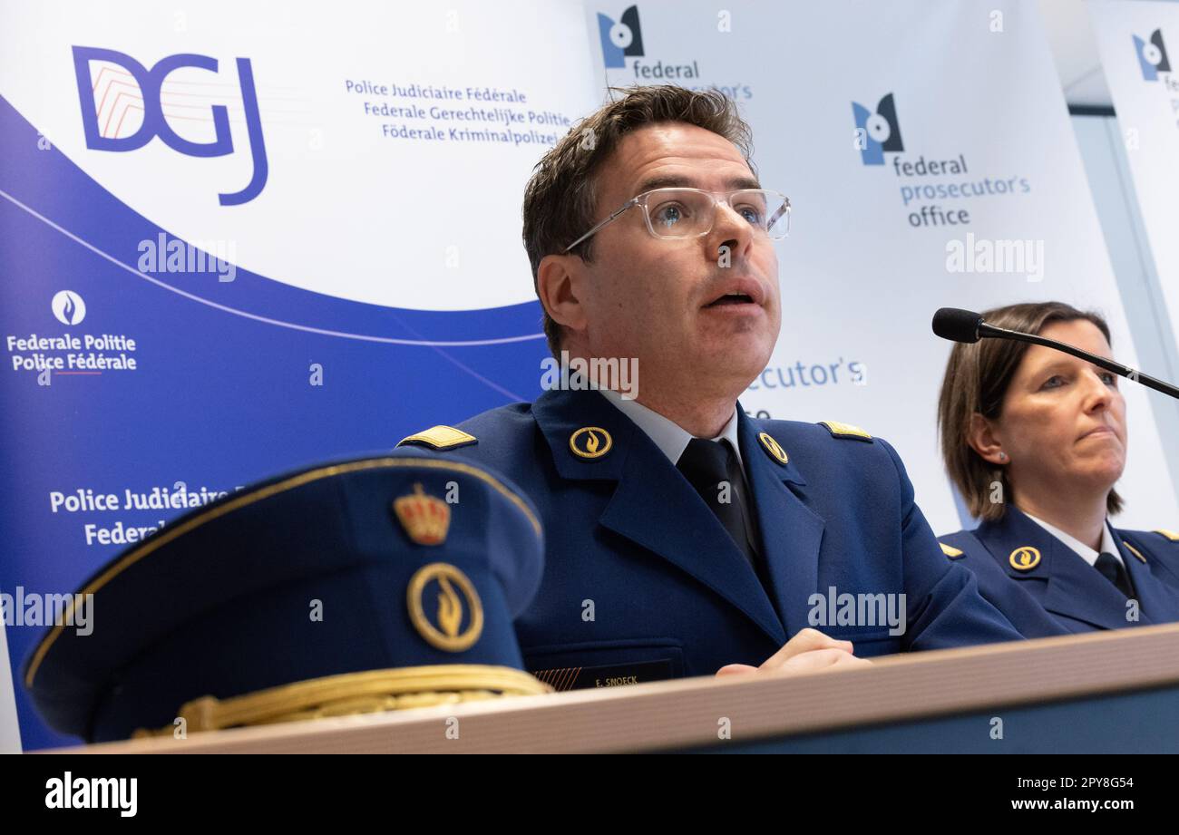 Federal Judicial Police Director-General Eric Snoeck and FGP Limburg's Sophie Lever pictured during a press conference, in Brussels, regarding a large-scale European operation which took place across several countries earlier this morning, Wednesday 03 May 2023. It concerns a file opened by the Belgian Federal Prosecutor's Office, in collaboration with the Limburg Prosecutor's Office, the Federal Judicial Police, Eurojust, Europol and various countries, in particular Italy. This operation targeted more than a hundred suspected members of the Calabrian mafia. More than 20 searches were carried Stock Photo
