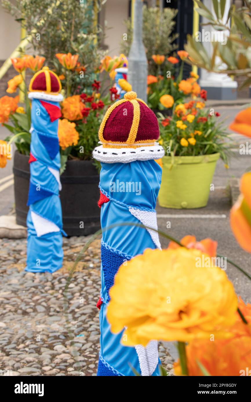 The traffic bollards in Alford Market Square are covered in knitted